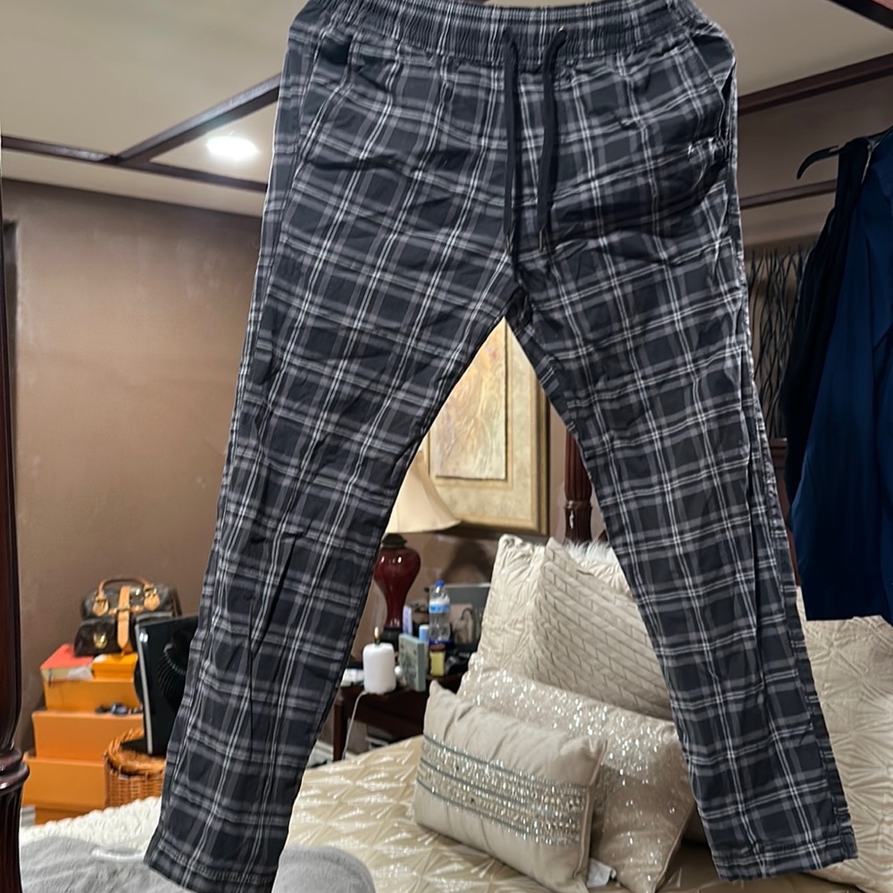 Hollister young men plaid almost new, black and grey joggers.